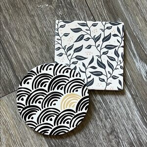 Two Patterned Porcelain and Cork Coasters